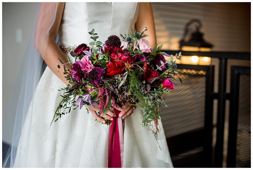 jewel-toned bouquet with trailing ribbon