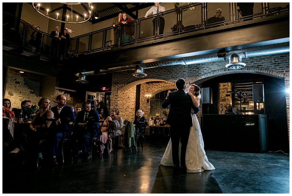 bride and groom first dance in hill country