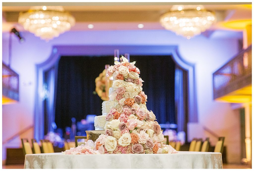 gorgeous wedding cake with floral cascade
