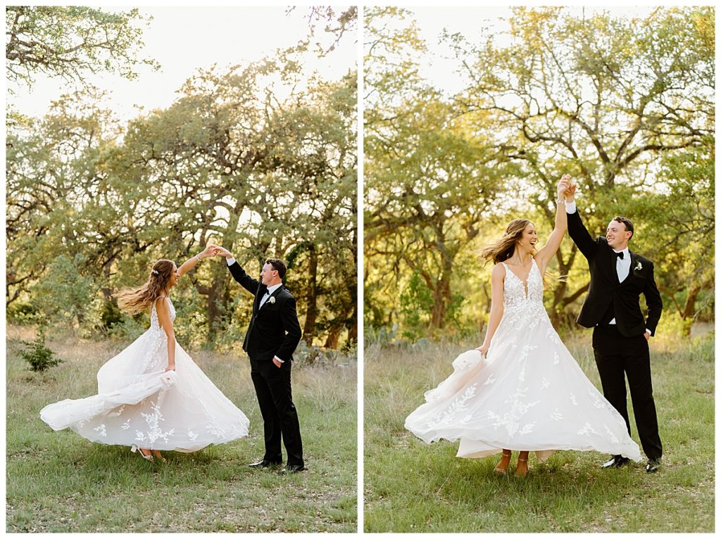 bride and groom twirl in field