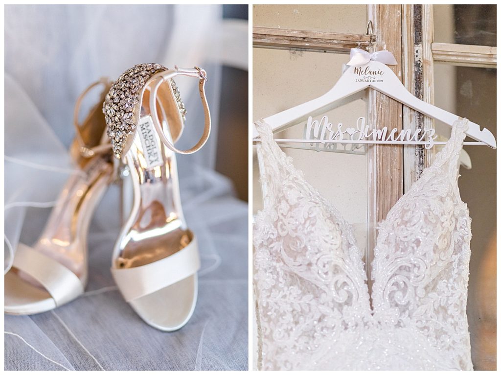 bride shoes and dress hanging on wedding day 