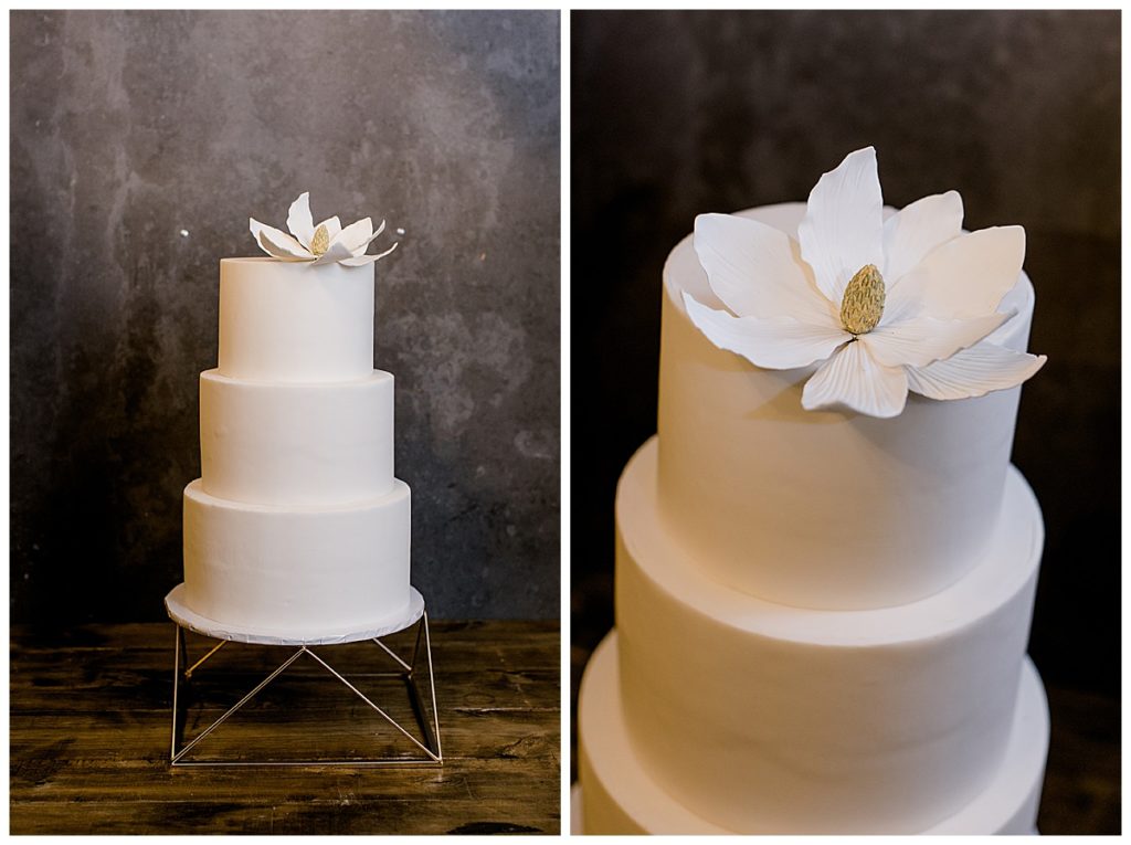 simple white wedding cake with flower top
