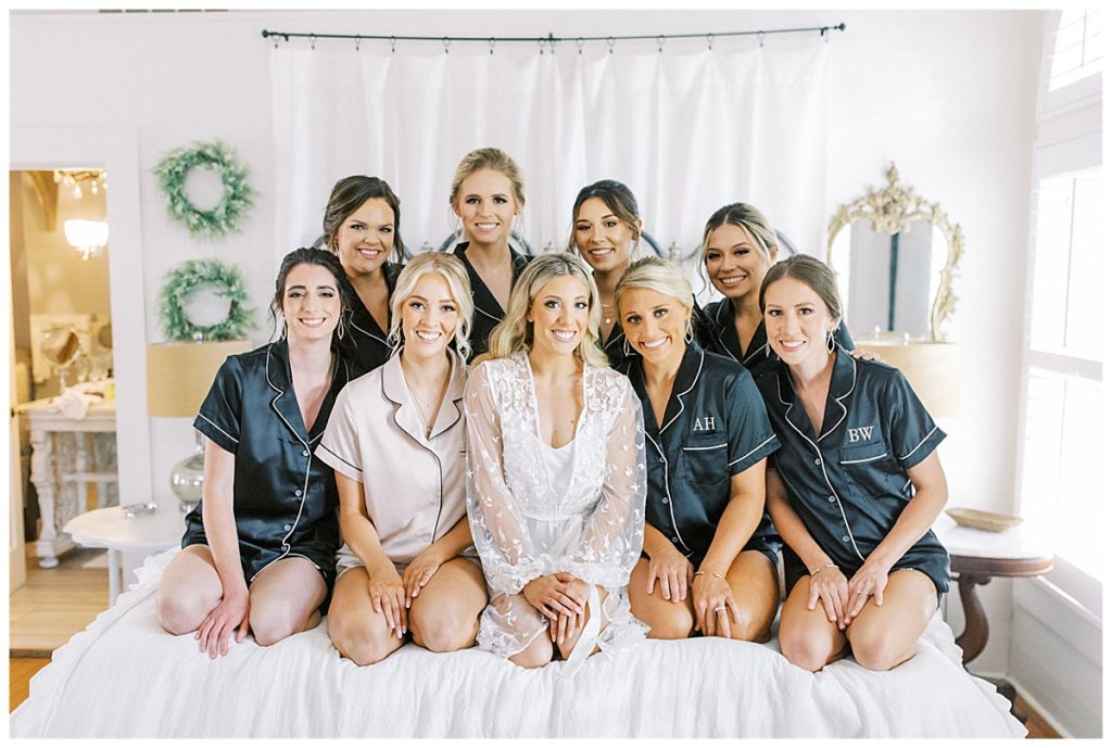 bride with bridesmaids in matching getting ready pajamas